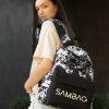 Женский рюкзак Sambag Active с принтом черный с белым
