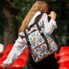 Женский рюкзак RollTop Milton черный с принтом