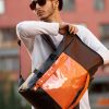Мужской рюкзак Sambag RollTop Hacking черный с оранжевым