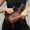 Сумка-бананка жіноча Sambag Dynamicdart чорна з помаранчевим