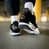 Кроссовки Nike Air Jordan 4 Retro Royalty Black/Metallic Gold-White