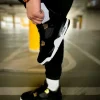 Кроссовки Nike Air Jordan 4 Retro Royalty Black/Metallic Gold-White